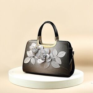 Elegant Floral Applique Black & silver Handbag with Gold Accents